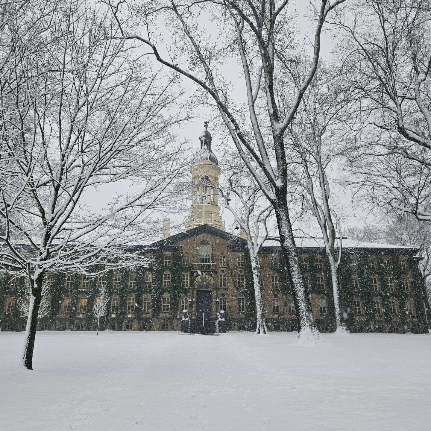 Photo of Nassau Hall during a winter snowstorm 