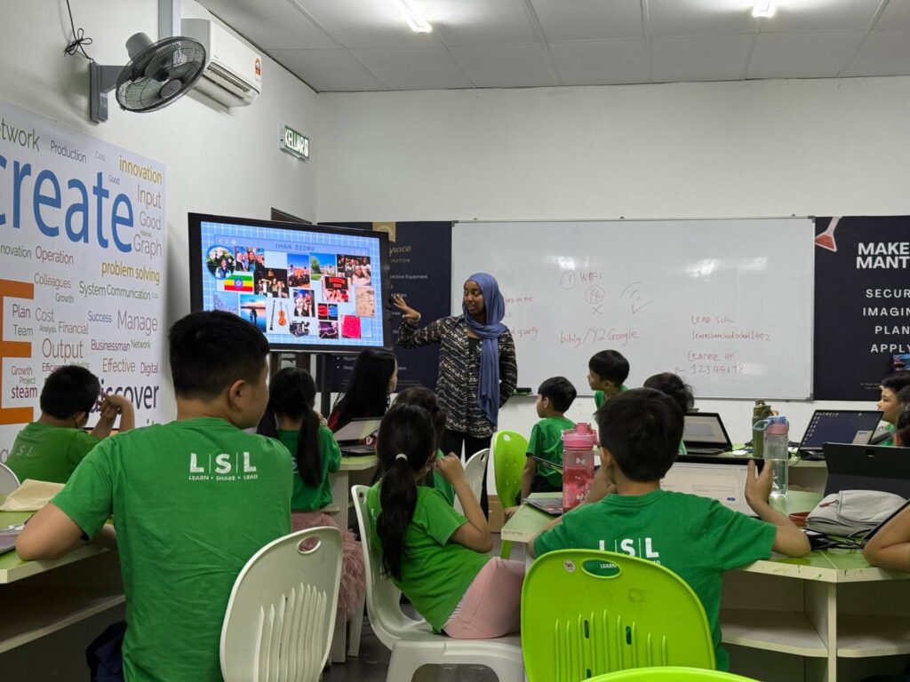 Iman Bedru engaging in a classroom setting.
