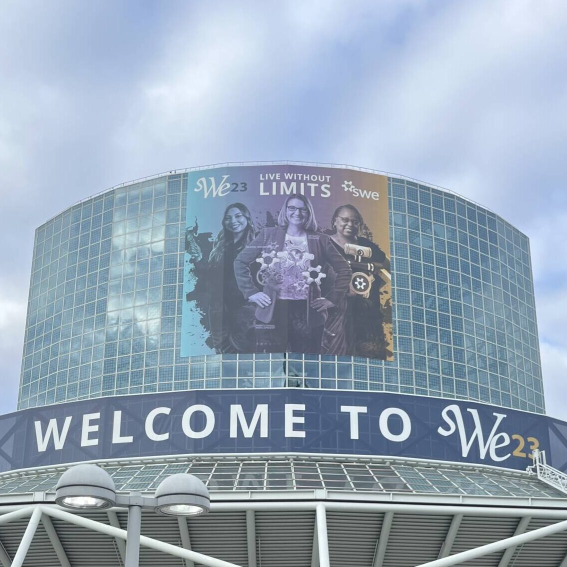 Showing a photo of the conference