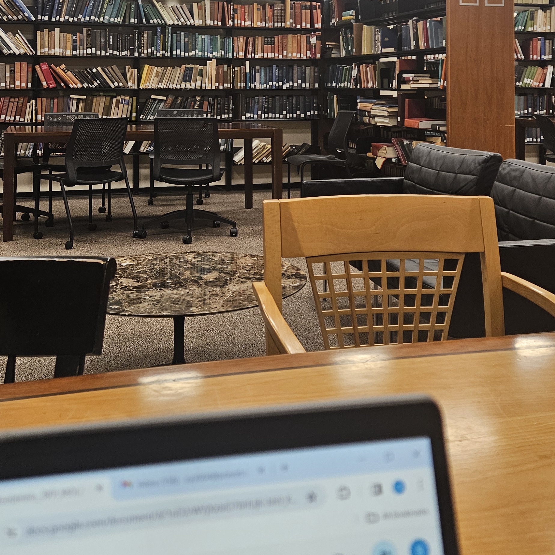 Forbes Library with a laptop in the foreground